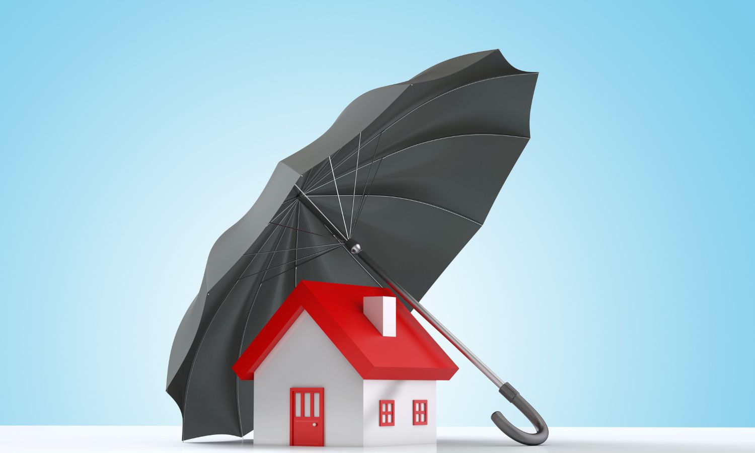 House model under a large black umbrella, symbolizing homeowners insurance.