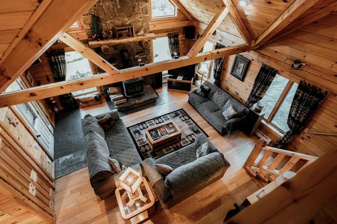 A cozy home interior decorated tastefully for the holidays, with warm lighting and a inviting atmosphere.
